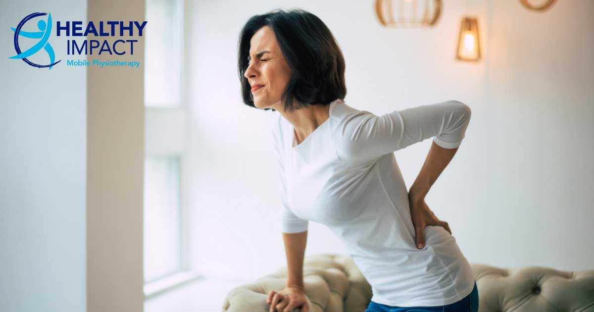 Sciatica article feature image of a woman with back pain